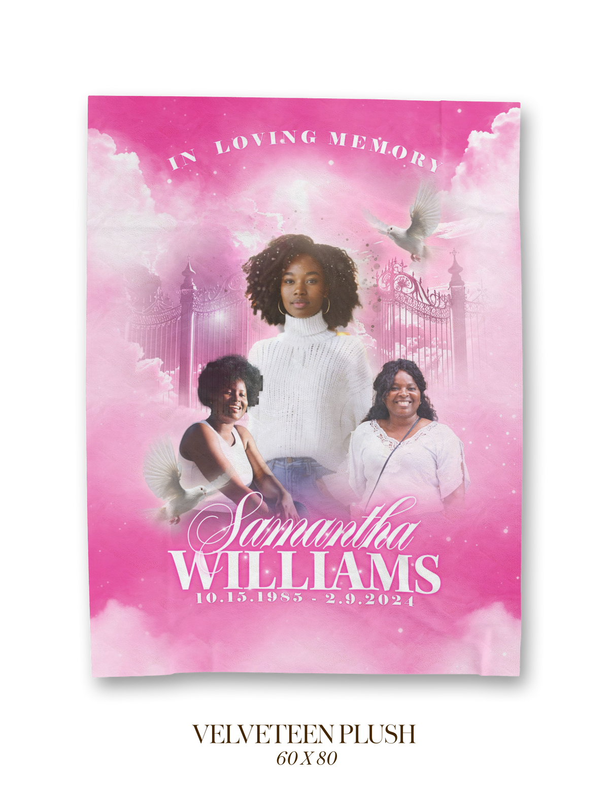Memorial blanket with pink angel scene and large white dove over three-person photo