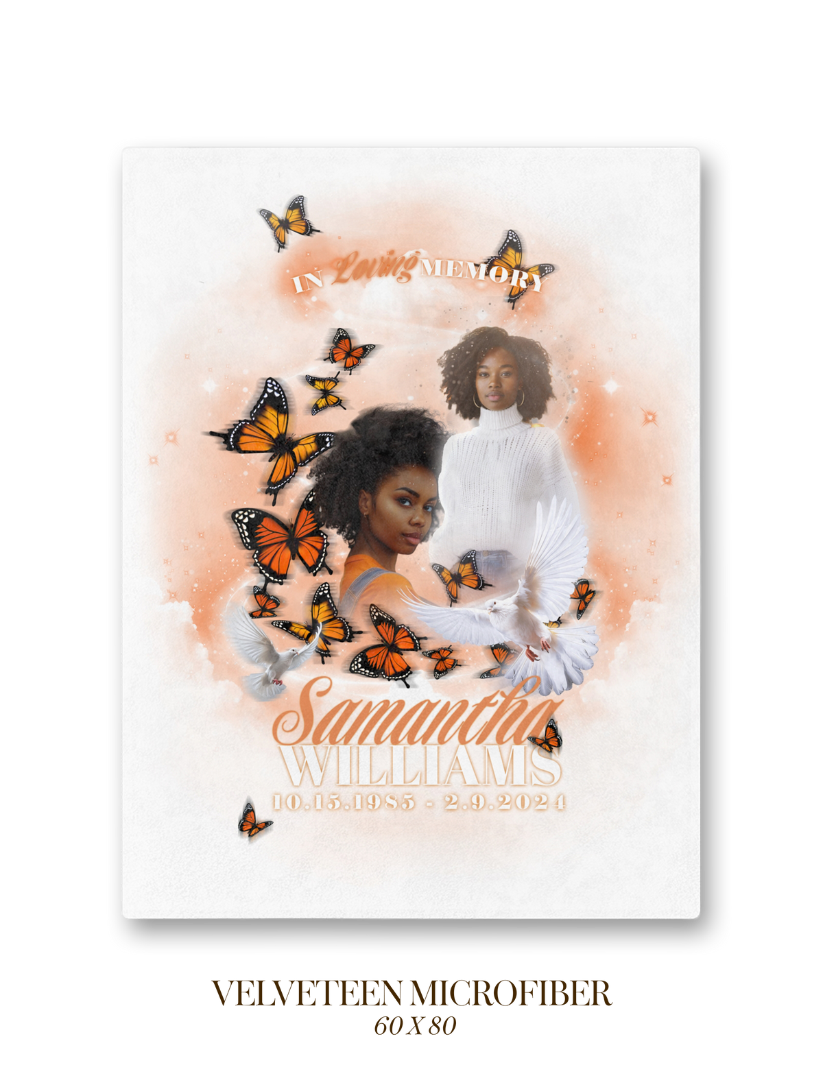 White memorial blanket featuring orange butterflies and two angel portraits, centered