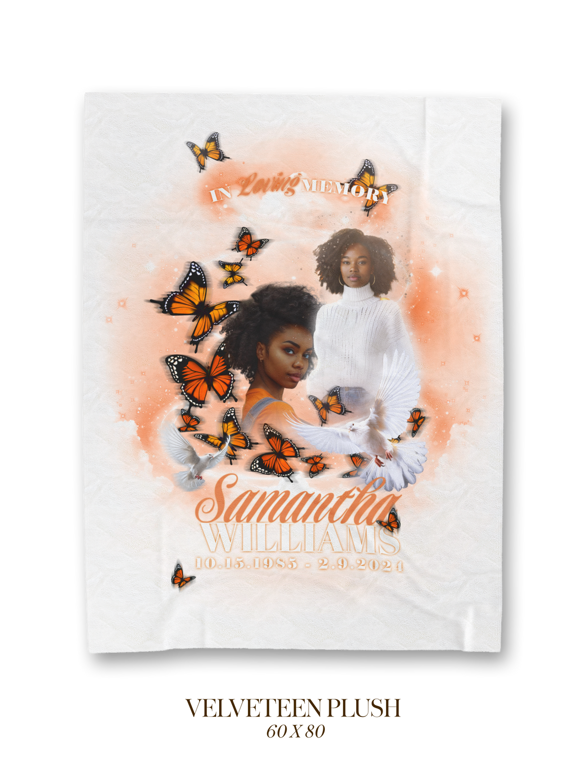 White memorial blanket with orange butterflies around two cherub portraits