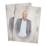 8-page portrait photo booklet with man in gray suit on cover