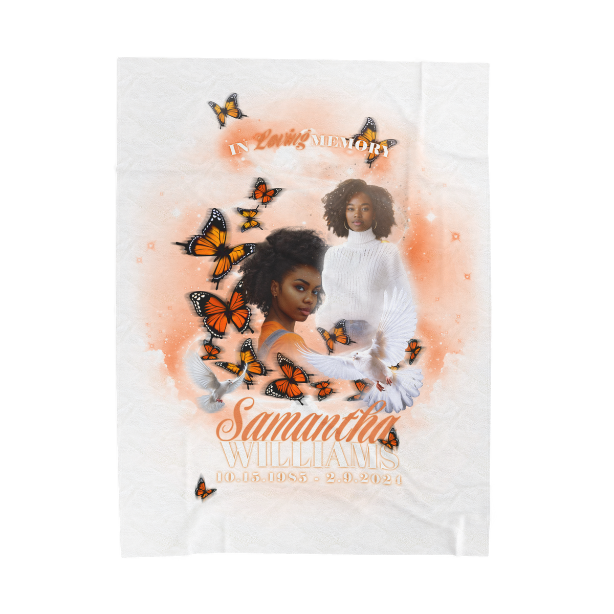 White memorial blanket with orange butterfly swirls and cherub portrait medallion
