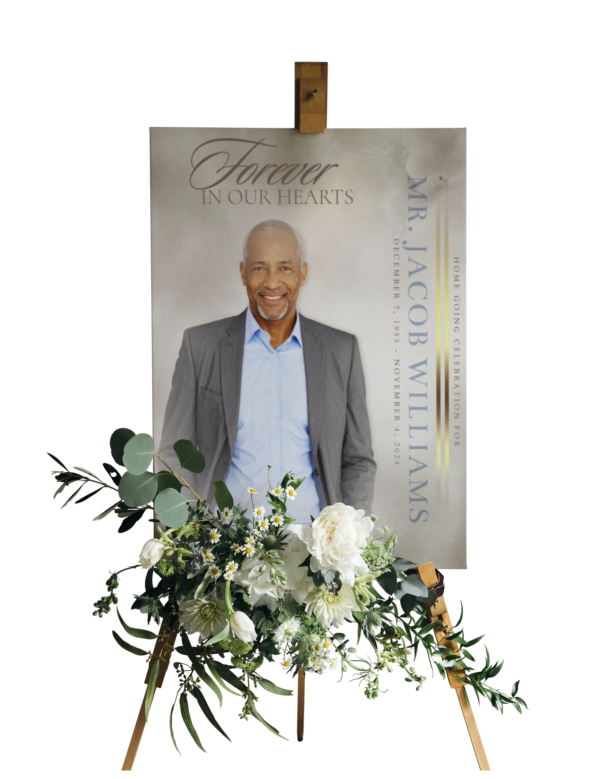 Funeral portrait print on easel with white and green flower tribute