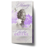 Trifold memorial program cover with woman's portrait, “In loving memory” title, and peony accents